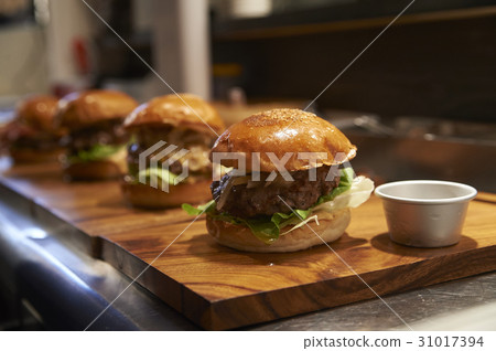 Cooking a hamburger Cooking a hamburger 31017394