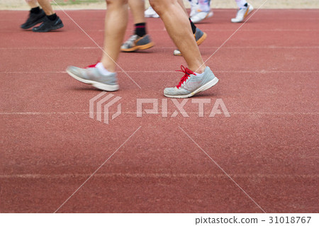 Group of walking and runners on racetrack Group of walking and runners on racetrack 31018767