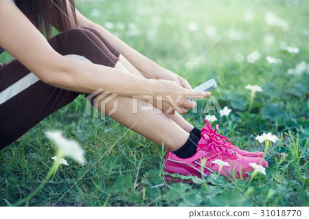 woman take photo white flowers on the field woman take photo white flowers on the field 31018770