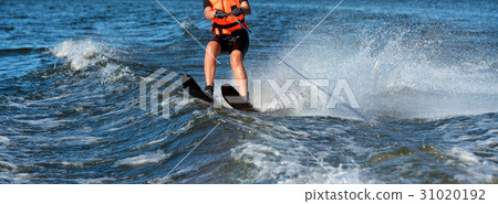 Woman riding water skis closeup. Body parts 31020192