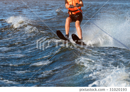 Woman riding water skis closeup. Body parts 31020193