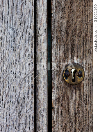 Old wooden door with metal lock close up texture 31021140