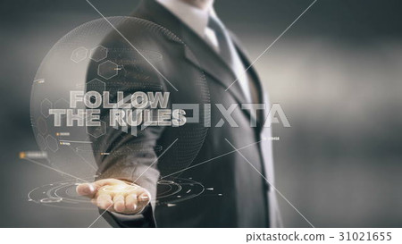 Follow The Rules with hologram businessman concept 31021655