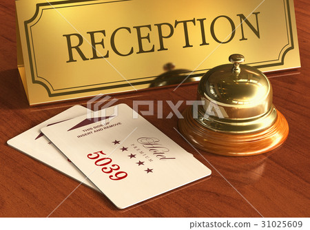 Service bell and cardkeys on hotel reception desk 31025609