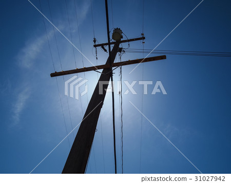 Silhouetted electric post Silhouetted electric post 31027942