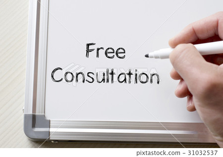 Free consultation written on whiteboard 31032537