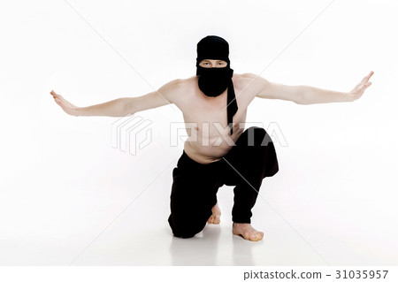 Ninja on white background. Male fighter in black 31035957