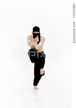 Ninja on white background. Male fighter in black 31035964