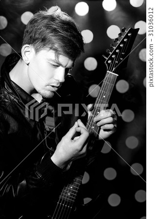 Black and white photo of young attractive rock 31036012