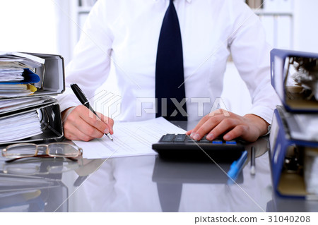 Close up of business woman making report Close up of business woman making report 31040208
