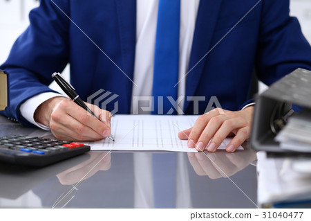 Close up view of bookkeeper or financial inspector Close up view of bookkeeper or financial inspector 31040477