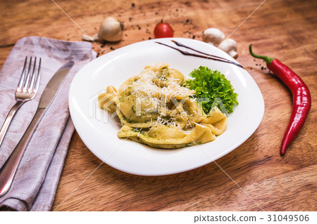 Tasty ravioli with parmesan 31049506