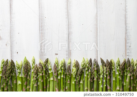 Fresh green asparagus in a row 31049750