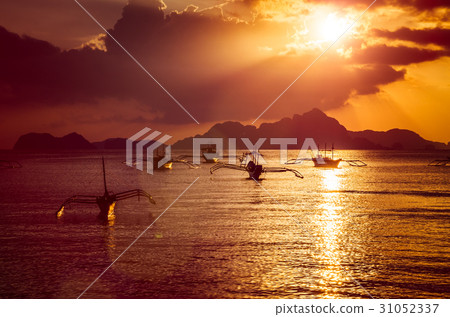 Traditional filippino boats at El Nido bay in 31052337