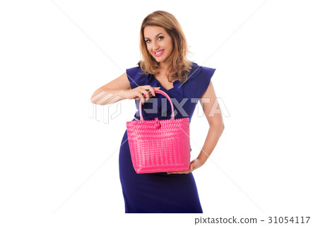 Pretty woman posing with bright tote bag.Isolated. 31054117