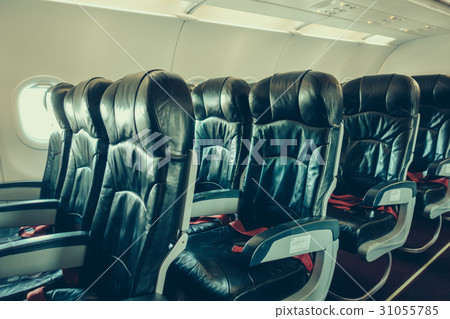 Airplane seats in the cabin . ( Filtered image processed vintage effect. ) 31055785
