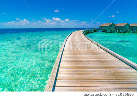Beautiful water villas in tropical Maldives island . Beautiful water villas in tropical Maldives island . 31056630