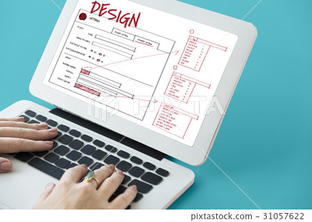 Hands working on laptop network graphic overlay 31057622