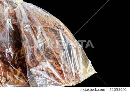 Dried fish with black background. Dried fish with black background. 31058091