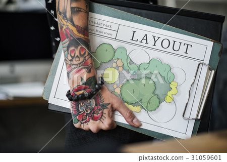 Hand holding notepad network graphic overlay 31059601