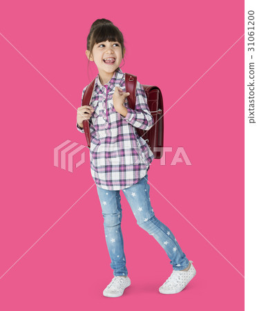 A girl with backpack is smiling 31061200