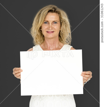 Caucasian blonde woman holding placard Caucasian blonde woman holding placard 31061243