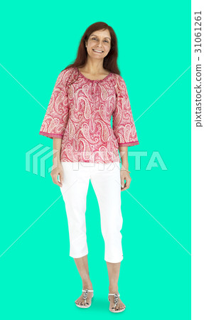 Woman standing smiling studio portrait 31061261