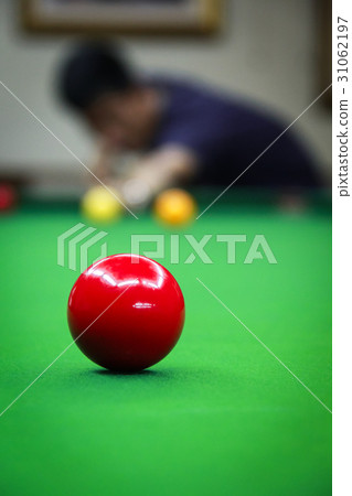 Red Ball Backgrouded with Man Playing Snooker Red Ball Backgrouded with Man Playing Snooker 31062197