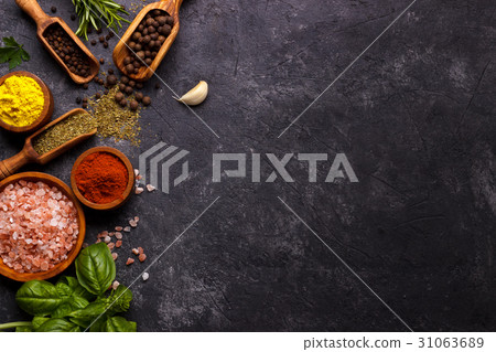 Herbs and spices over black 31063689