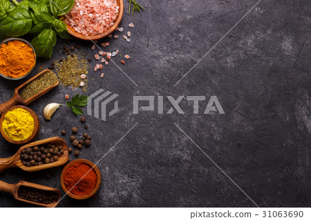 Herbs and spices over black Herbs and spices over black 31063690