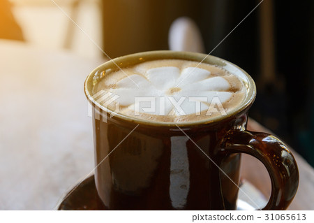 Hot cappuccino coffee in coffee shop 31065613