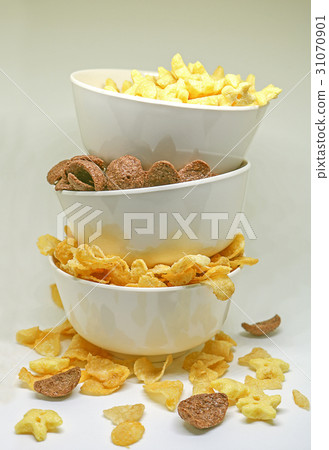Cornflake cereals in a white bowl. Cornflake cereals in a white bowl. 31070901