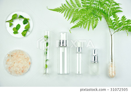 Cosmetic bottle containers with green herbal leave 31072505