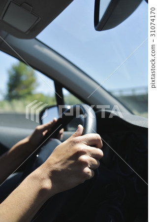 young man driving a car young man driving a car 31074170
