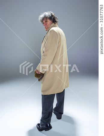 The senior man as detective or boss of mafia on The senior man as detective or boss of mafia on 31077763