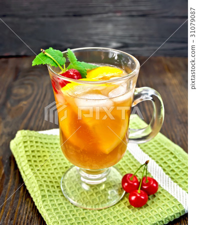 Lemonade cherry and orange in wineglass 31079087