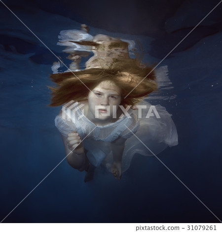 Portrait of a young girl under the water Portrait of a young girl under the water 31079261
