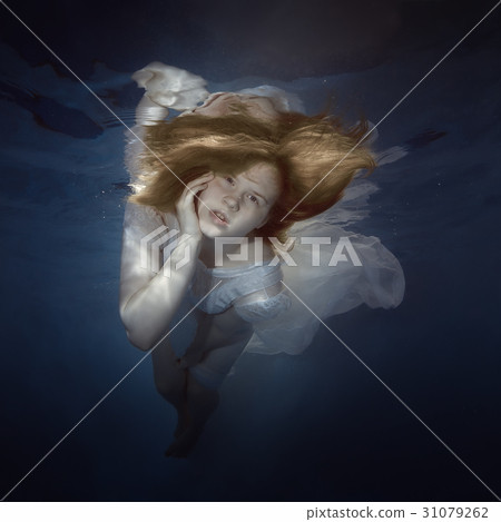 Portrait of a young girl under the water Portrait of a young girl under the water 31079262
