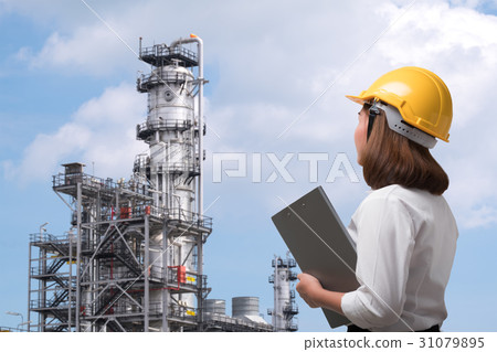 Female engineer in oil industry, pipeline factory 31079895