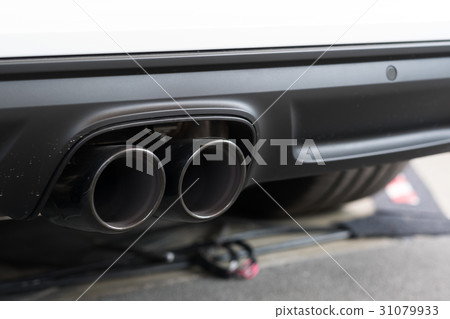 Closeup sport car muffler Closeup sport car muffler 31079933