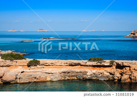 beautiful island and turquoise waters in Cala  31081019