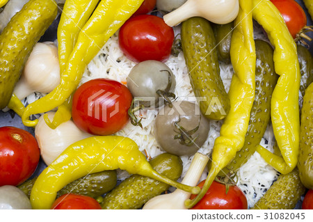 Background of pickled cucumbers, tomatoes, garlic, Background of pickled cucumbers, tomatoes, garlic, 31082045