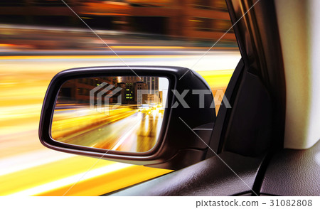 rear-view of moving car at night rear-view of moving car at night 31082808