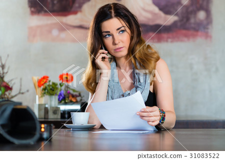Student or businesswoman working in cafe Student or businesswoman working in cafe 31083522