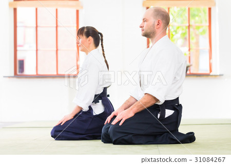 Teacher and student at Aikido martial arts school Teacher and student at Aikido martial arts school 31084267