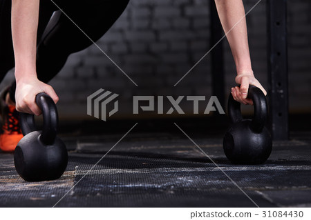 Close-up photo of young athlete woman's hands 31084430