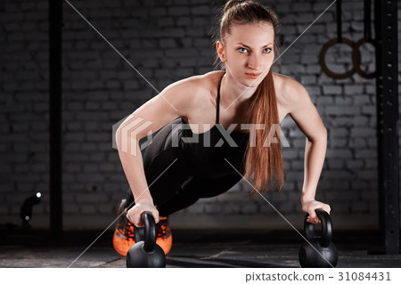 Young sporty woman in the black sportwear doing 31084431