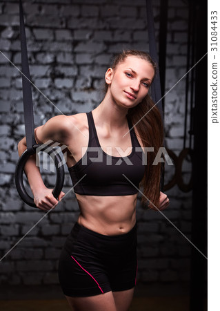 Portrait of a young sporty woman in the black 31084433