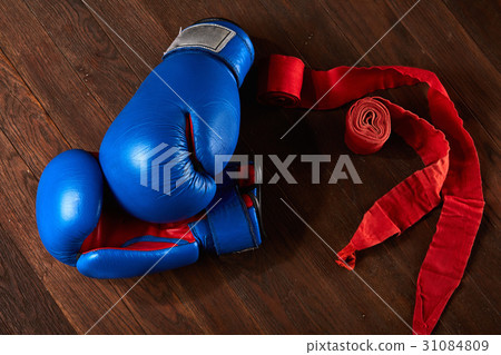 Top view of blue and red boxing gloves and bandage Top view of blue and red boxing gloves and bandage 31084809