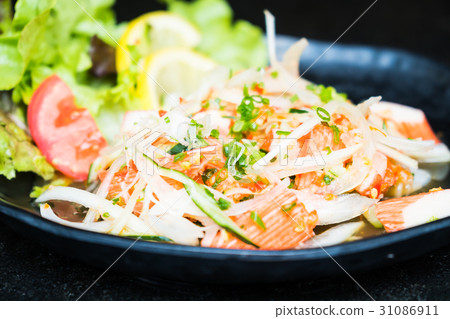 Spicy crab stick salad 31086911